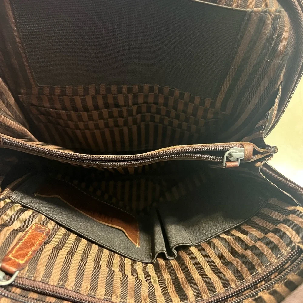 Jack George’s brown leather back pack
